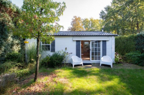 84, gelegen in het rustige & bosrijke Oisterwijk! Met privétuin
